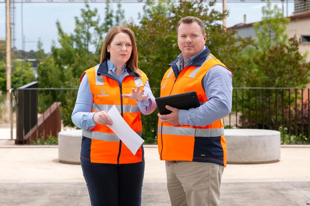 WHS consultant conducting a site walk-through with an Adelaide business owner.